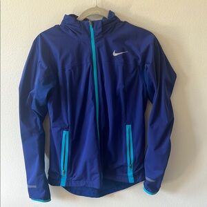 Nike Blue Shield Light Training Jacket with Teal Accents